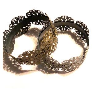Pair of bronze and silver colored bangles